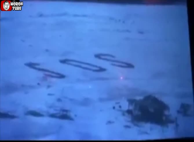 Video :A huge SOS etched on the sand saves three castaways